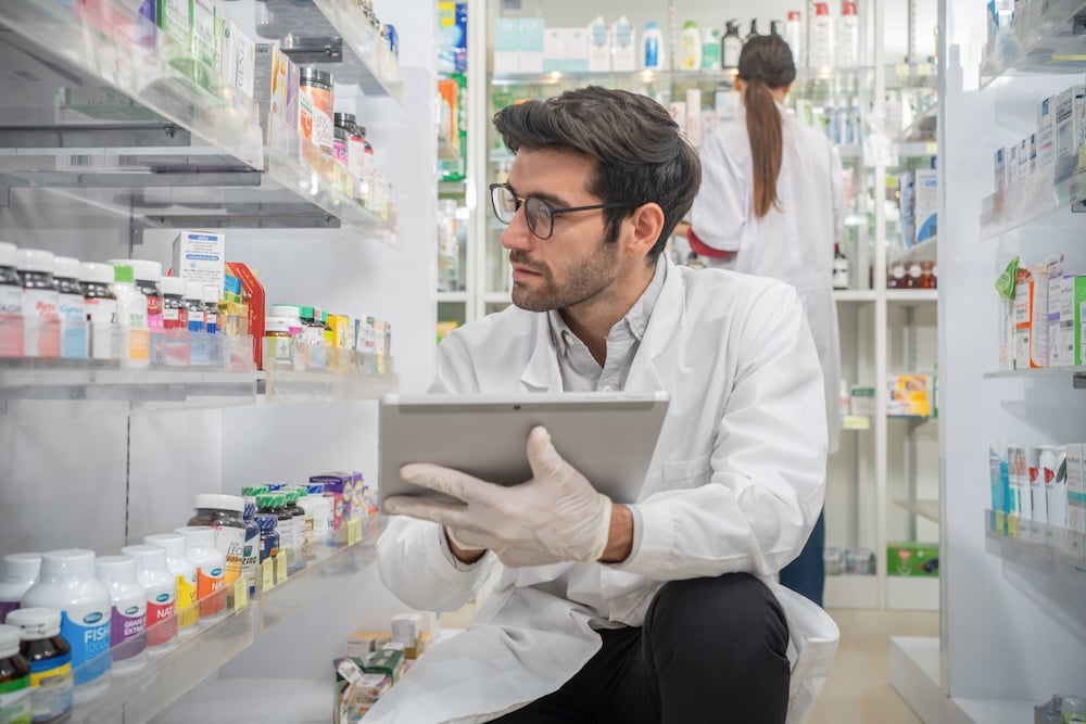 pharmacist behind the counter pharmacist behind the counter